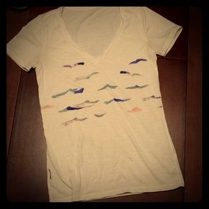 Ibex tee. Womens xs / small. Cream w colored birds